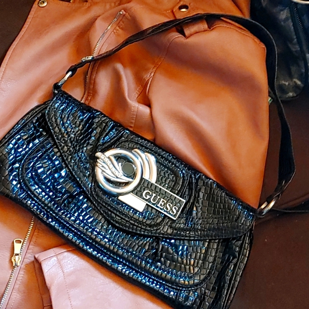 Guess patent alligator leather clutch